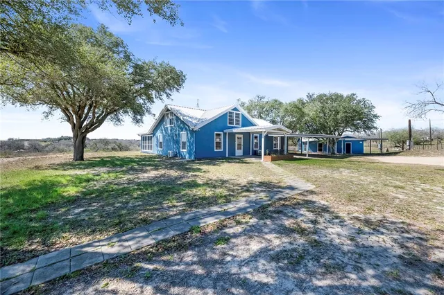 a house view with a garden space