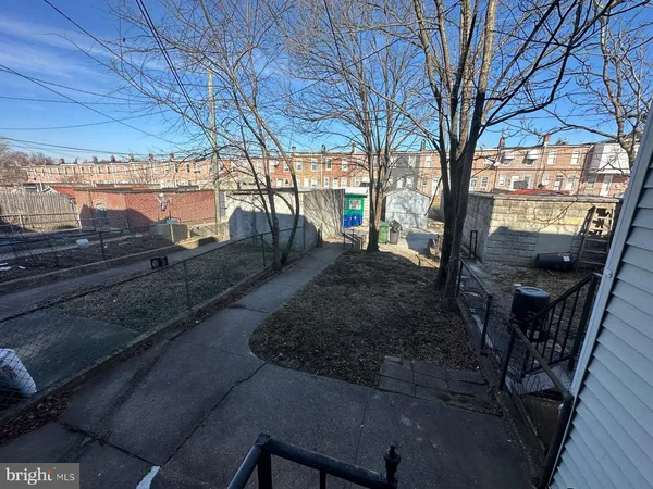 a view of a yard with an outdoor space