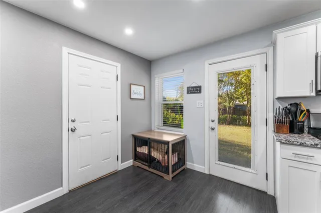 a room with furniture and a window