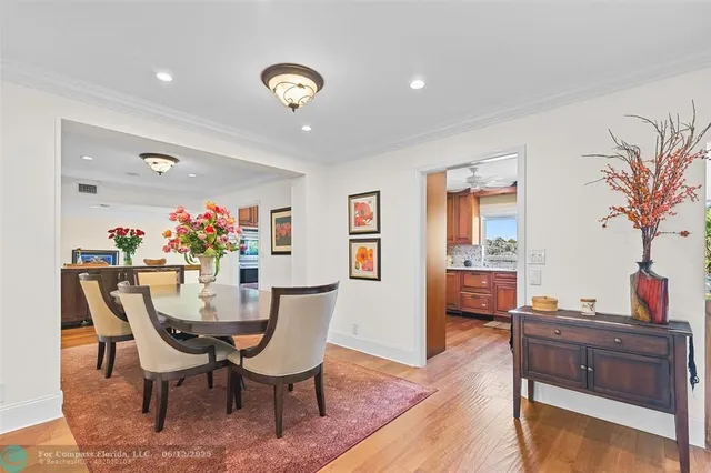 a kitchen with stainless steel appliances granite countertop a refrigerator and cabinets