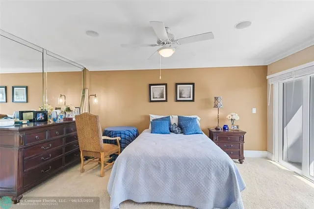 a work room with furniture and a flat screen tv