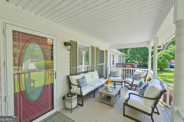 a balcony with furniture
