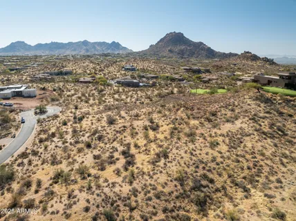 an aerial view of residential house and outdoor space