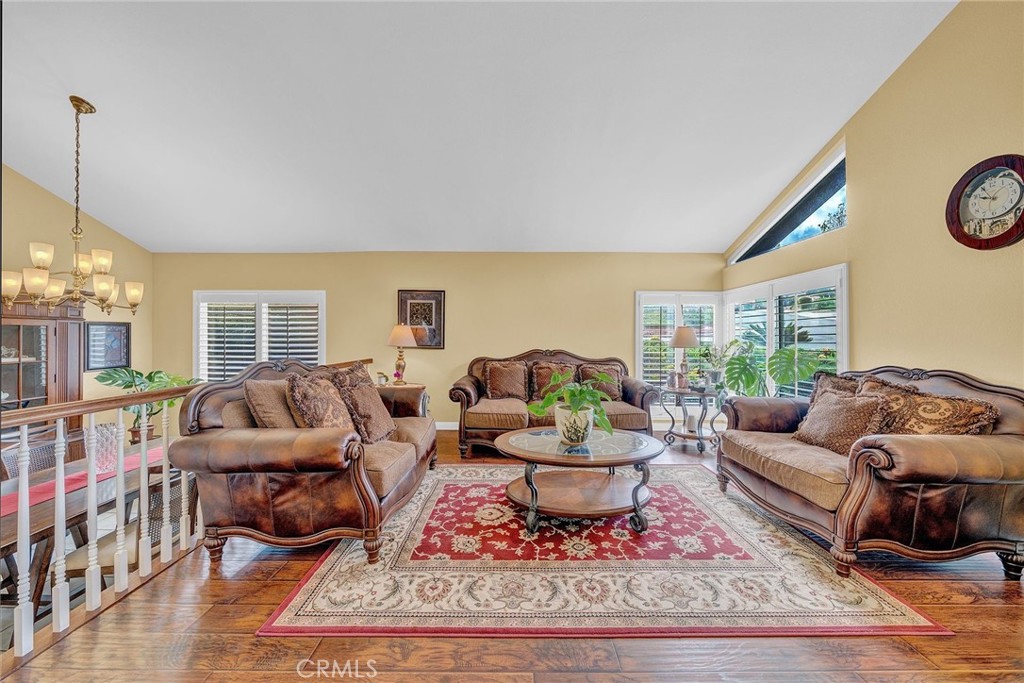 23419 Sandridge Road Diamond Bar, CA 91765 - Photo 16 of 51 a living room with furniture a rug and a table