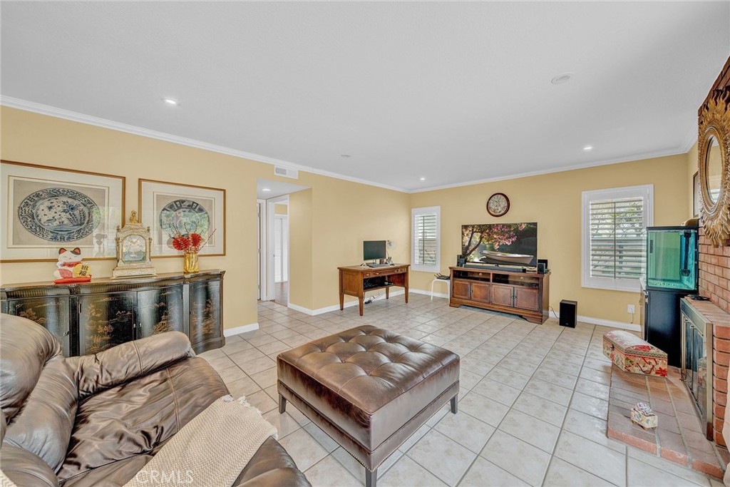 23419 Sandridge Road Diamond Bar, CA 91765 - Photo 27 of 51 a living room with furniture and a flat screen tv
