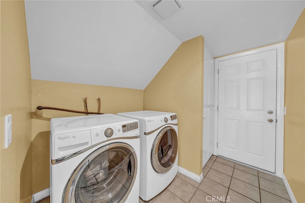 23419 Sandridge Road Diamond Bar, CA 91765 - Photo 37 of 51 a view of storage and utility room with washer and dryer