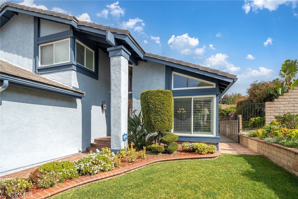 23419 Sandridge Road Diamond Bar, CA 91765 - Photo 4 of 51 a house view with a garden space