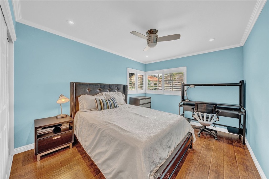 23419 Sandridge Road Diamond Bar, CA 91765 - Photo 51 of 51 a bedroom with a bed and a chandelier