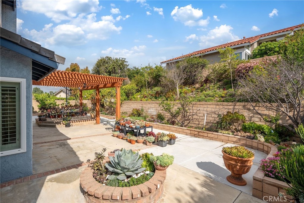 23419 Sandridge Road Diamond Bar, CA 91765 - Photo 10 of 51 a view of a patio with a table and chairs