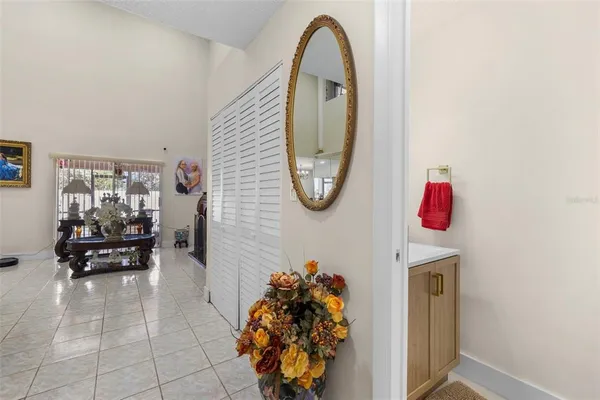 a very nice looking room with a chair and a mirror
