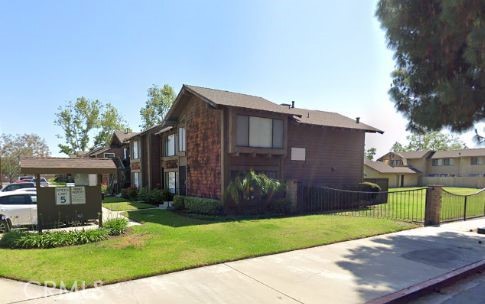 901 South Sutter Creek Road, Unit 48 Anaheim, CA 92804 - Photo 1 of 1 front view of a house with a yard