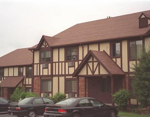 41 Canterbury Road, Unit 41 Bridgeport, CT 06606 - Photo 1 of 1 a car parked in front of a house
