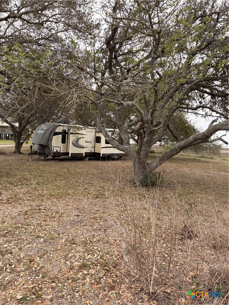 14 Pelican Point Avenue Port Lavaca, TX 77979 - Photo 7 of 9 a view of car parked in front of a house