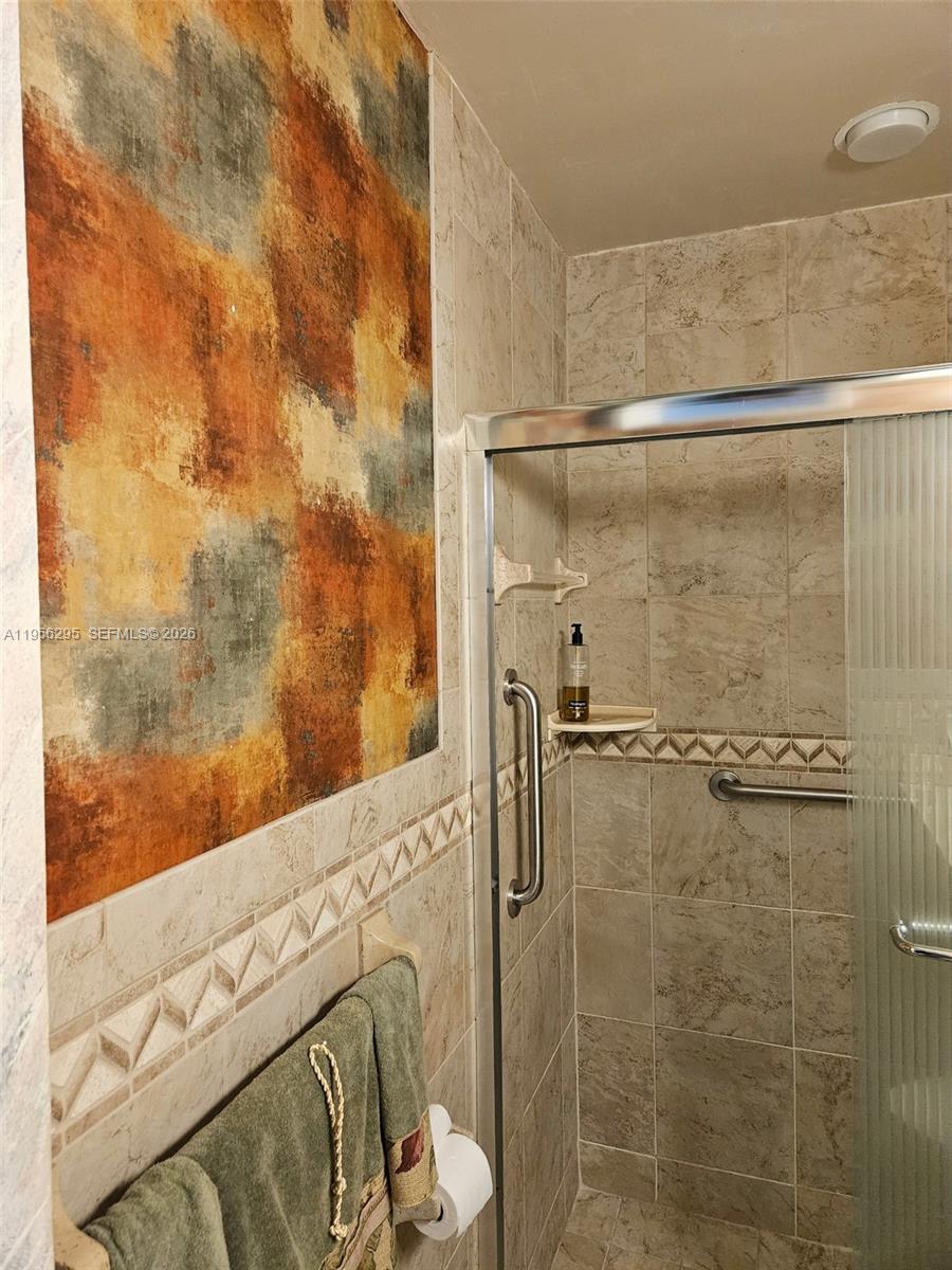 10301 Greenbriar Court Boca Raton, FL 33498 - Photo 15 of 43 a bathroom with a shower