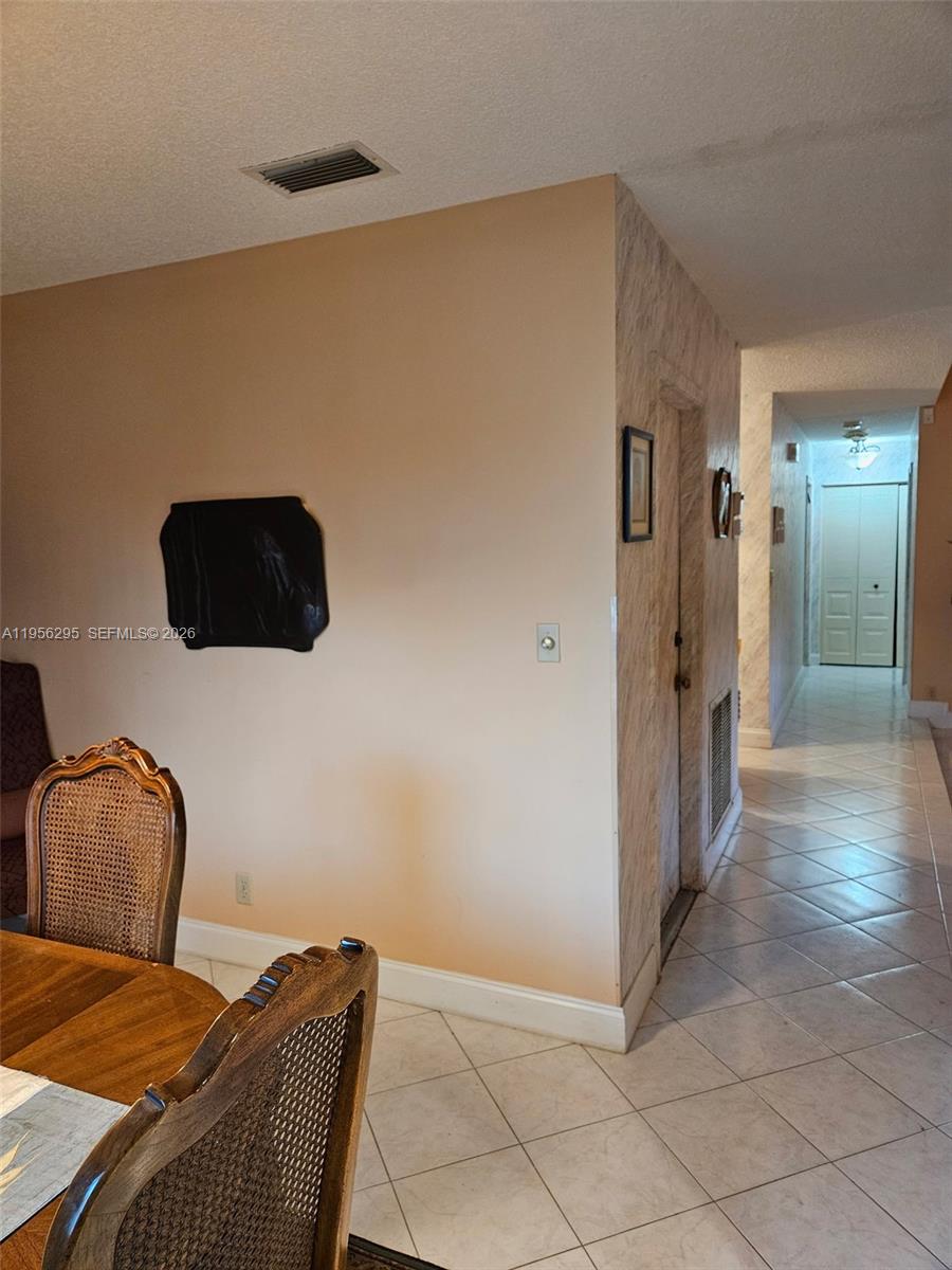 10301 Greenbriar Court Boca Raton, FL 33498 - Photo 24 of 43 a bedroom with a bed and teddy bear on bed
