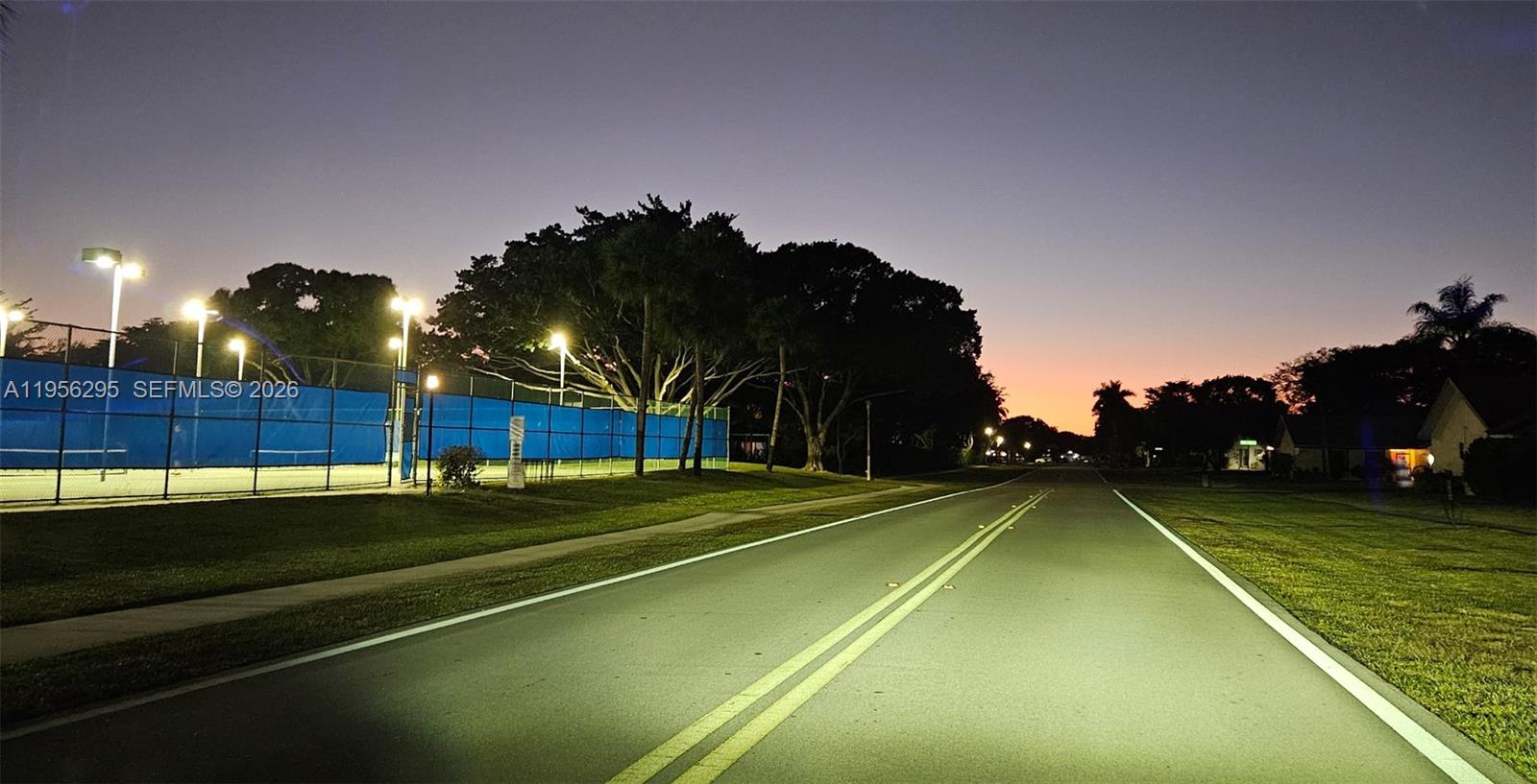 10301 Greenbriar Court Boca Raton, FL 33498 - Photo 42 of 43 a view of tennis court