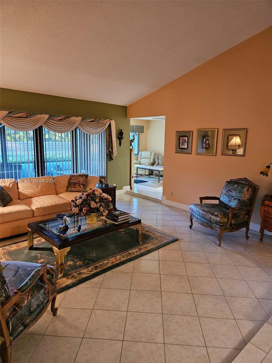 10301 Greenbriar Court Boca Raton, FL 33498 - Photo 6 of 43 a living room with furniture