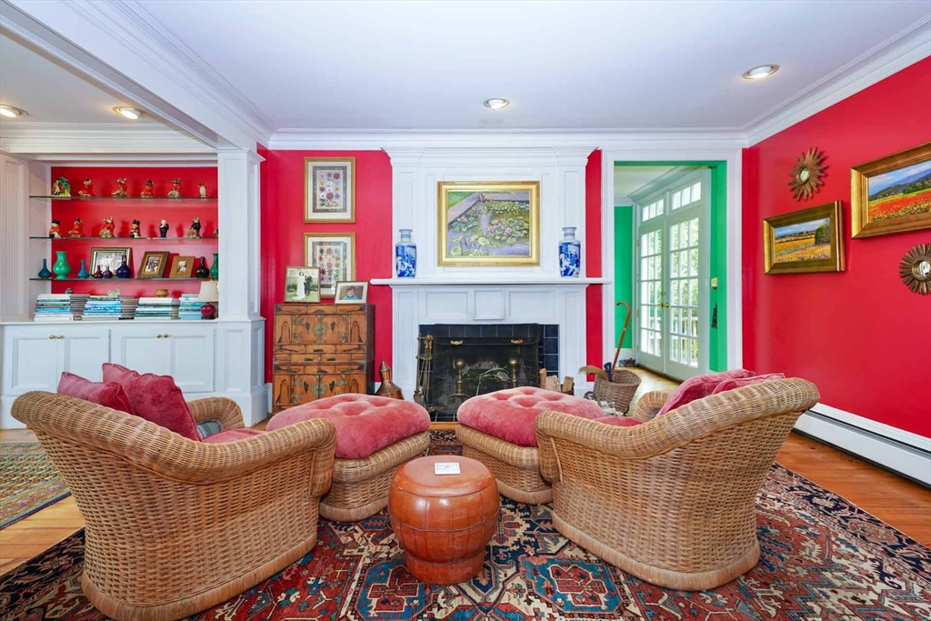 1 Louis Field Road Edgartown, MA 02539 - Photo 13 of 23 a living room with furniture and a fireplace