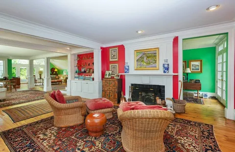 a living room with furniture or couch and a fireplace