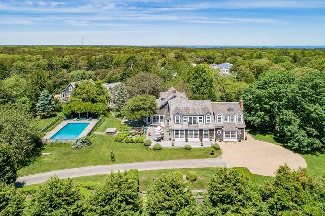 a view of a house with a big yard