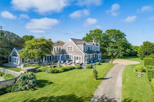 a view of a house with a big yard