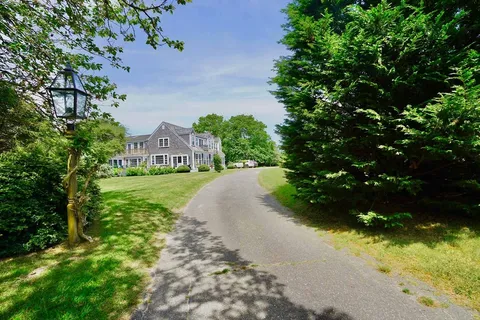 a view of a garden with a fountain