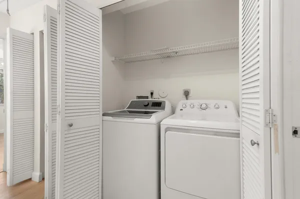 a utility room with dryer and washer