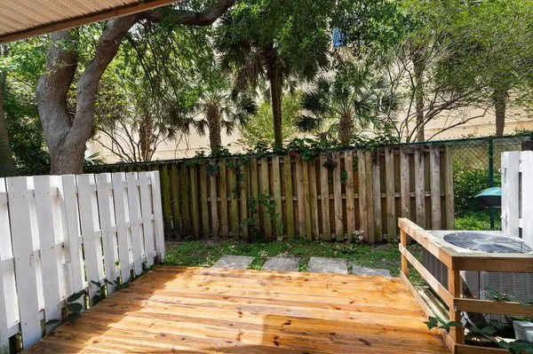 a view of a backyard with a small cabin