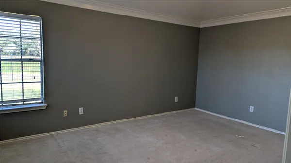 an empty room with a window