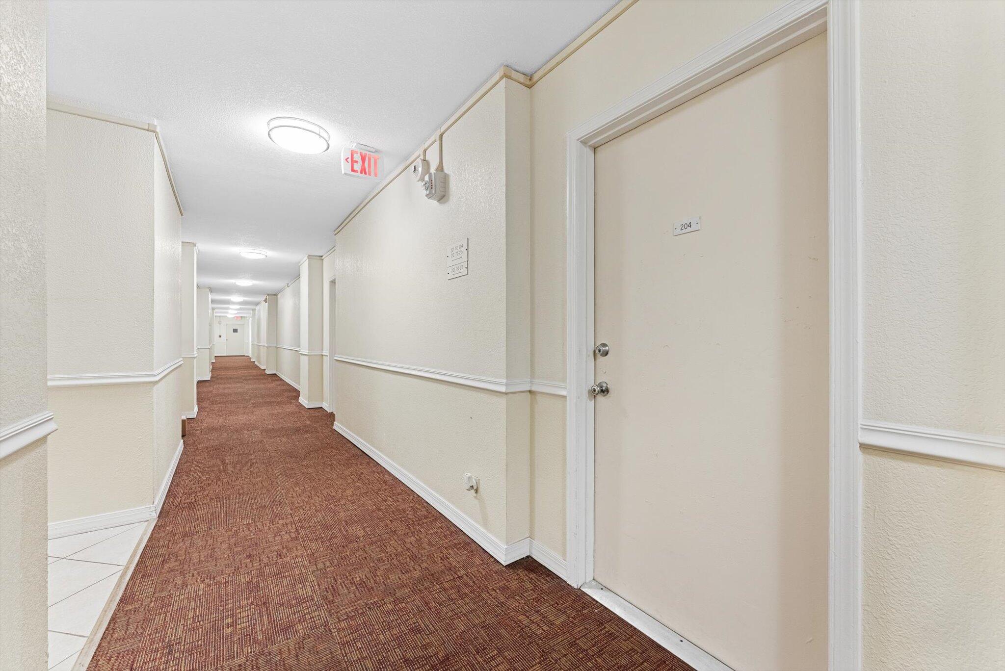 200 South Birch Road, Unit 204 Fort Lauderdale, FL 33316 - Photo 10 of 21 a view of a hallway with the white walls
