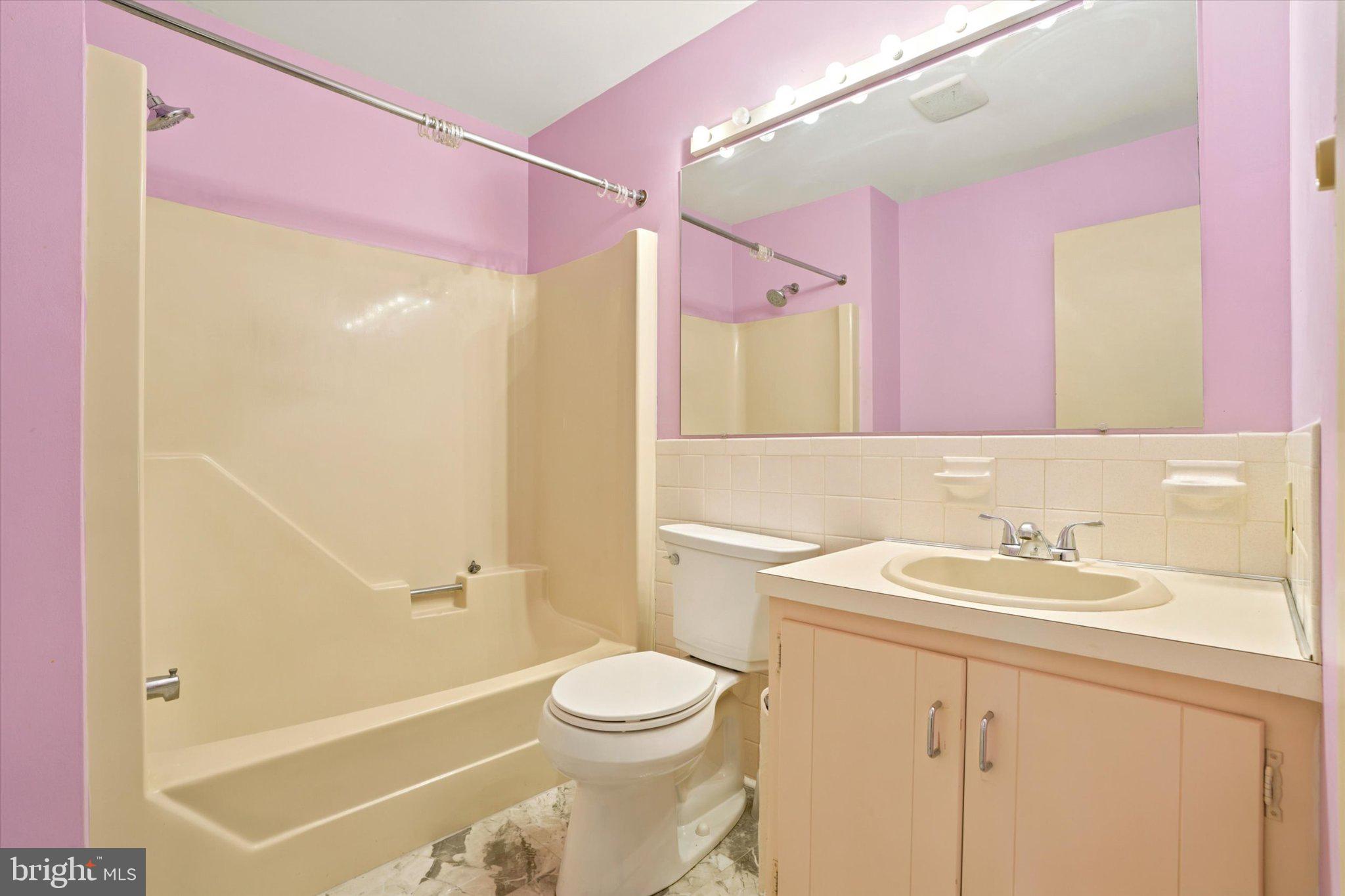 18 Medinah Drive Reading, PA 19607 - Photo 17 of 25 Charming pastel bathroom retreat.