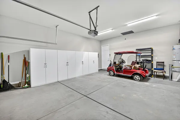 a view of parking garage with cars