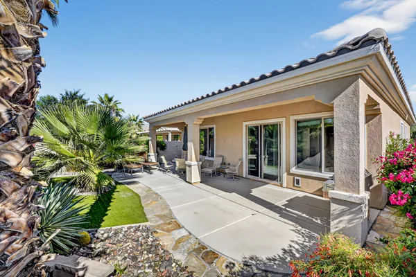front view of a house with a patio