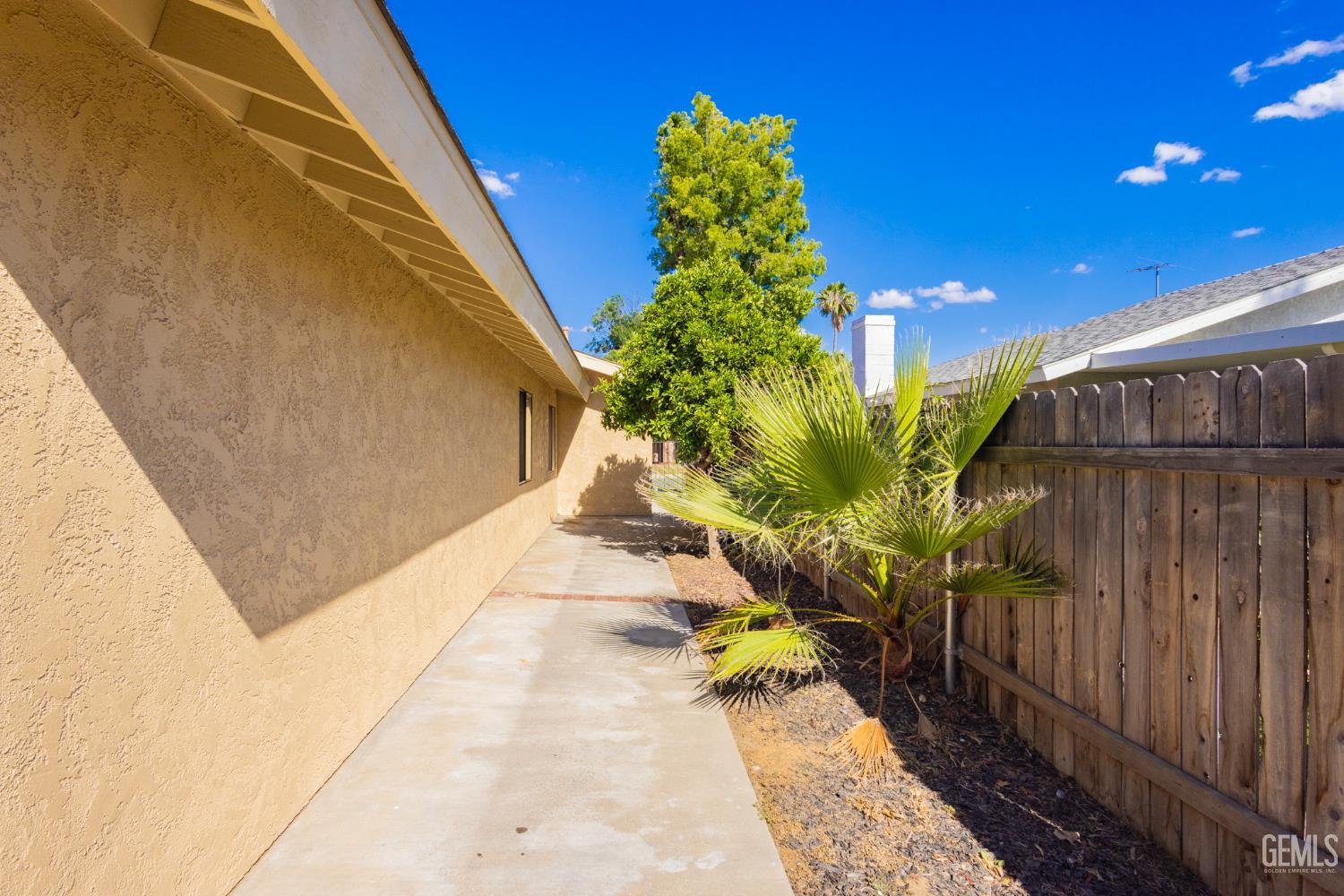 Undisclosed Address Bakersfield, CA 93309 - Photo 24 of 37 a view of a pathway with a yard