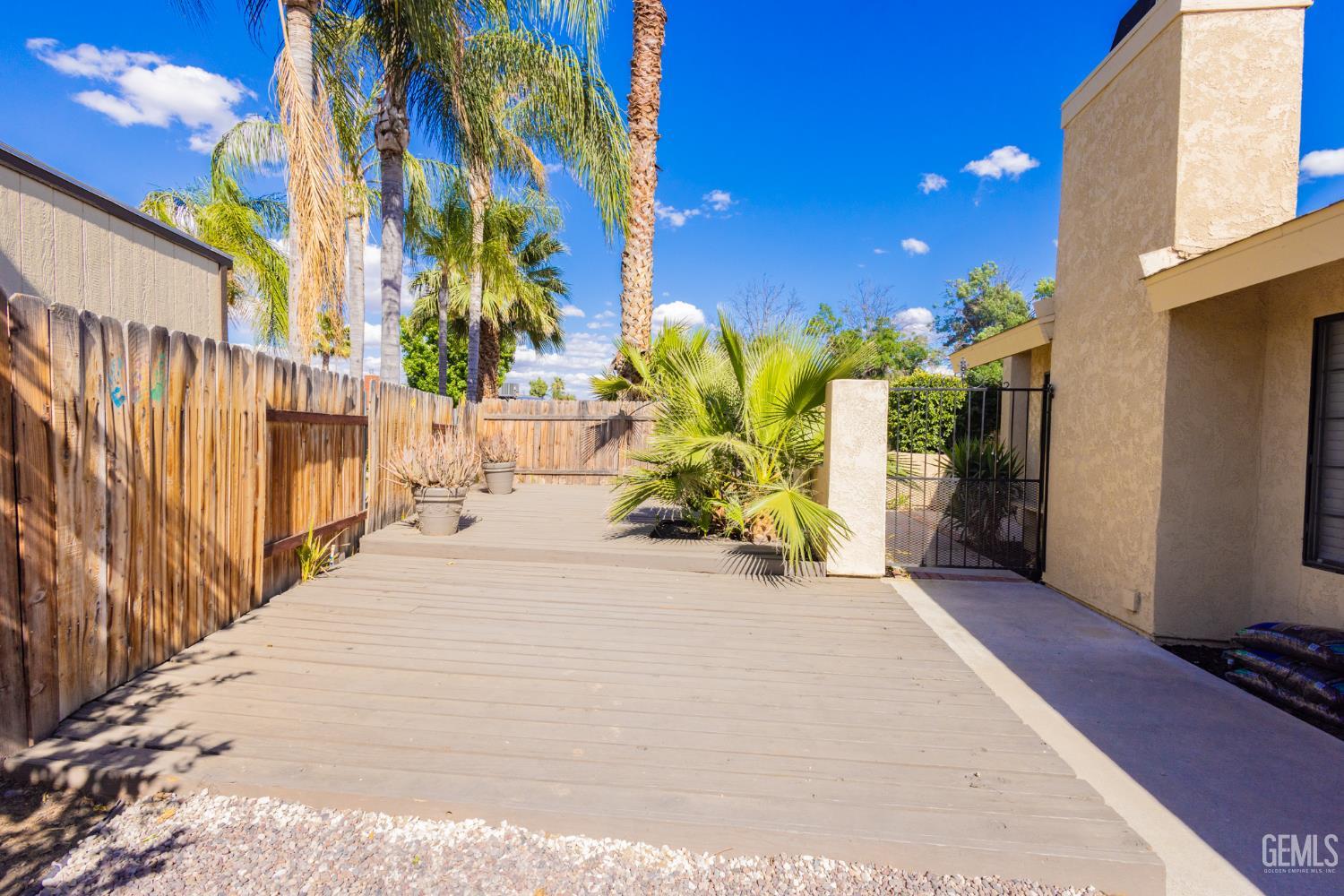 Undisclosed Address Bakersfield, CA 93309 - Photo 30 of 37 a view of a street with a building in the background