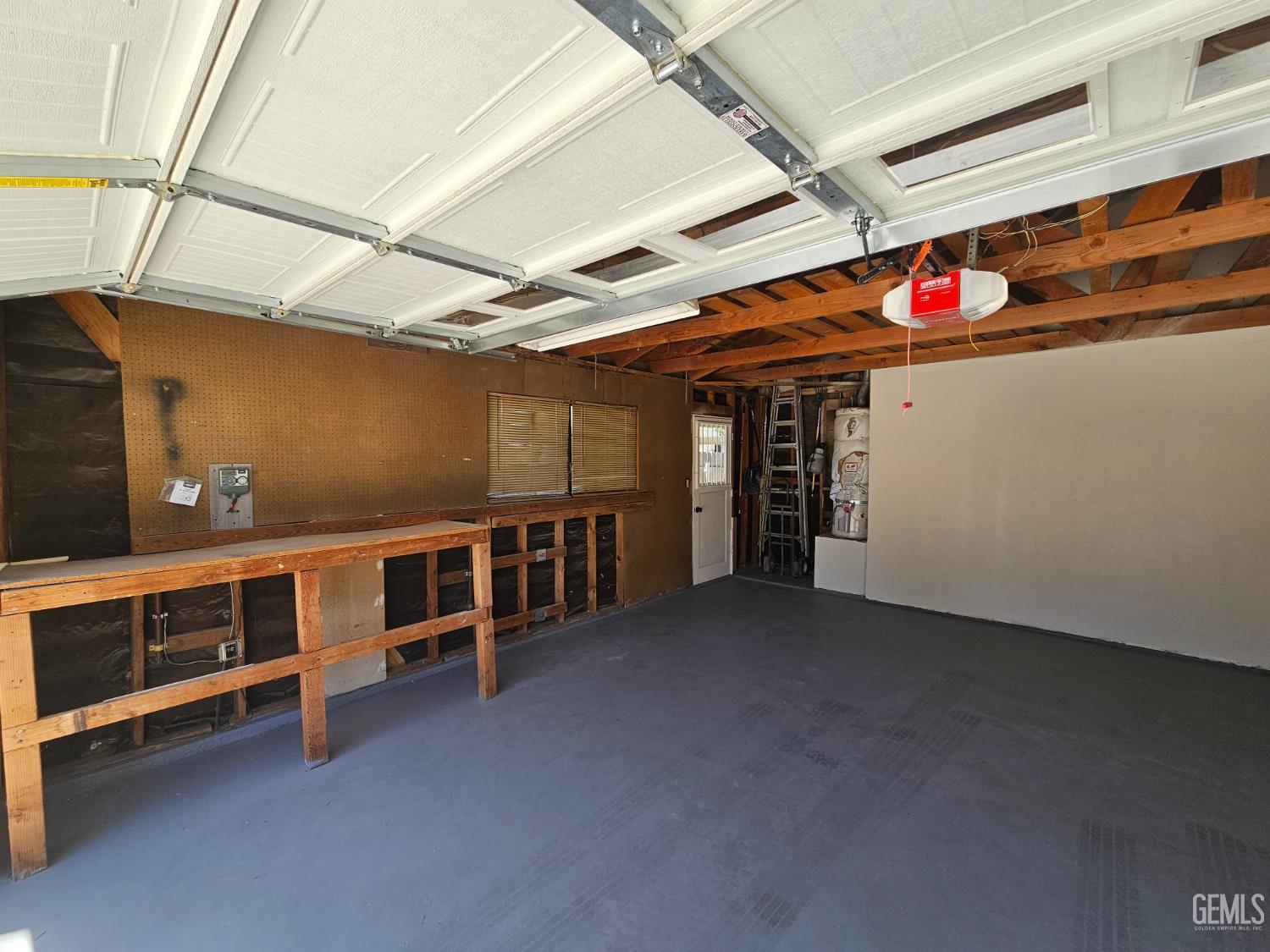 Undisclosed Address Bakersfield, CA 93309 - Photo 36 of 37 a view of an empty room with wooden ceiling