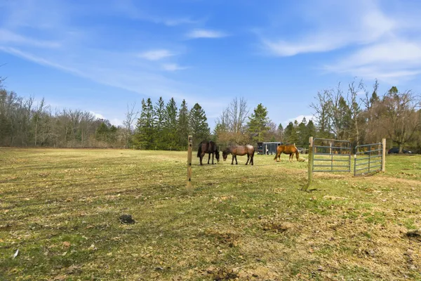 $525,000 | 58765 Travis Road, New Hudson, MI 48165