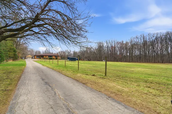 $525,000 | 58765 Travis Road, New Hudson, MI 48165