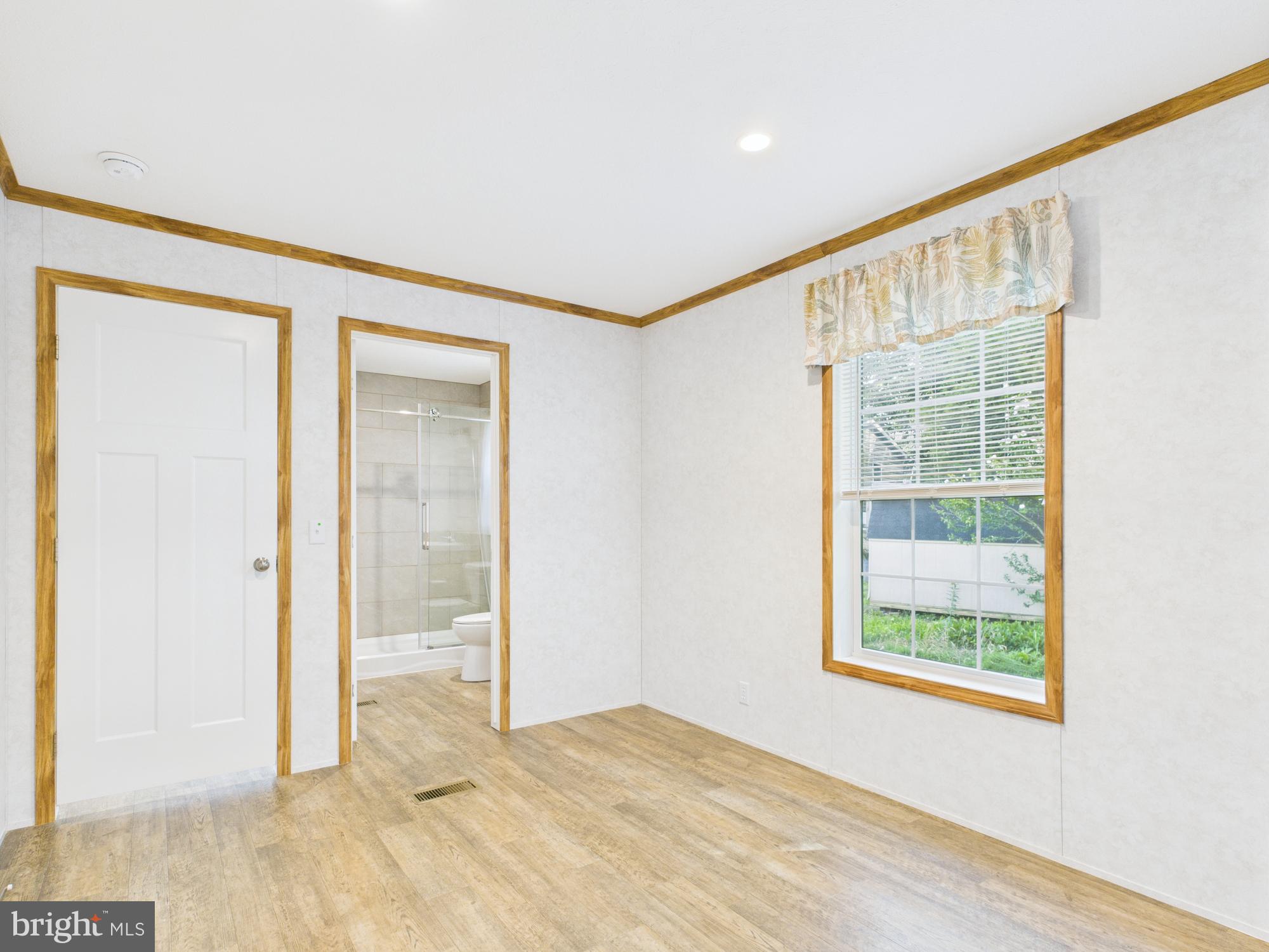 140 Rustique Drive York, PA 17408 - Photo 11 of 25 a view of an empty room and window