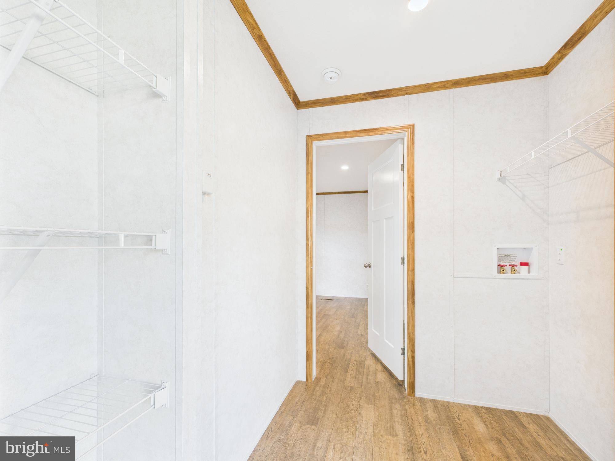 140 Rustique Drive York, PA 17408 - Photo 20 of 25 a view of a hallway with wooden floor