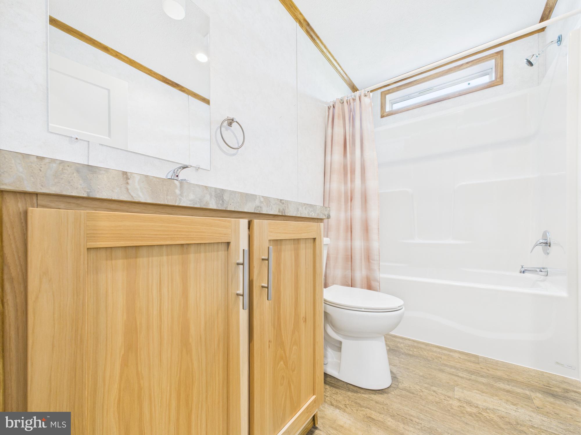140 Rustique Drive York, PA 17408 - Photo 7 of 25 a bathroom with a sink a toilet and shower