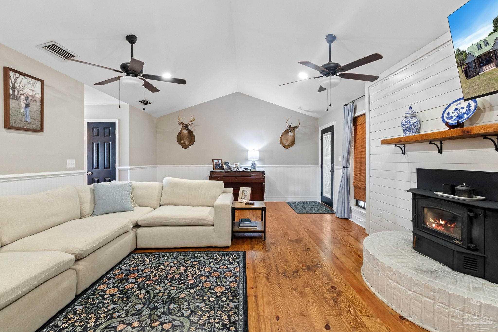 4349 Turkey Hollow Road Frisco City, AL 36445 - Photo 11 of 64 a living room with furniture and a fireplace