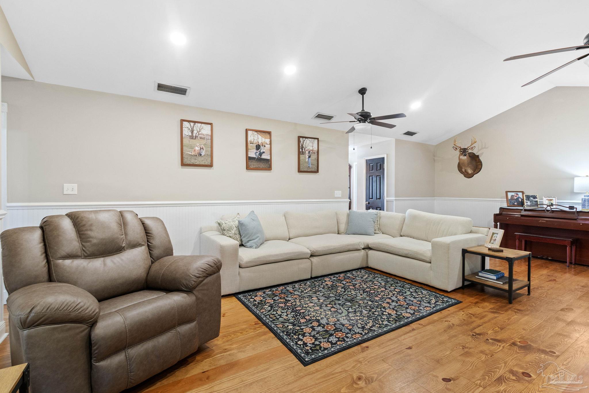 4349 Turkey Hollow Road Frisco City, AL 36445 - Photo 12 of 64 a living room with furniture and a couch