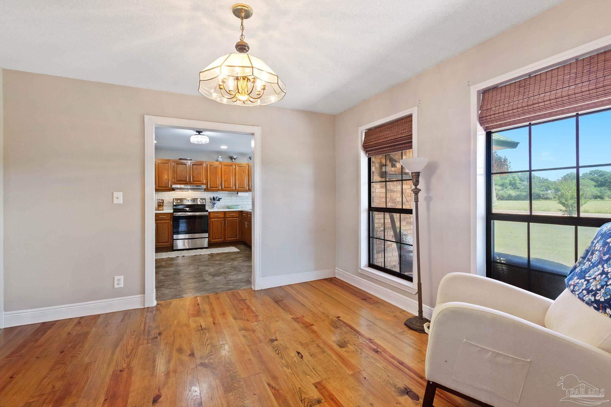 4349 Turkey Hollow Road Frisco City, AL 36445 - Photo 29 of 64 a bedroom with a bed and a window