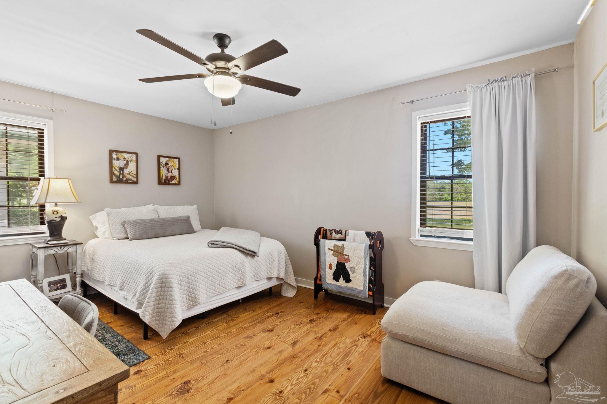 4349 Turkey Hollow Road Frisco City, AL 36445 - Photo 38 of 64 a bedroom with a bed and window