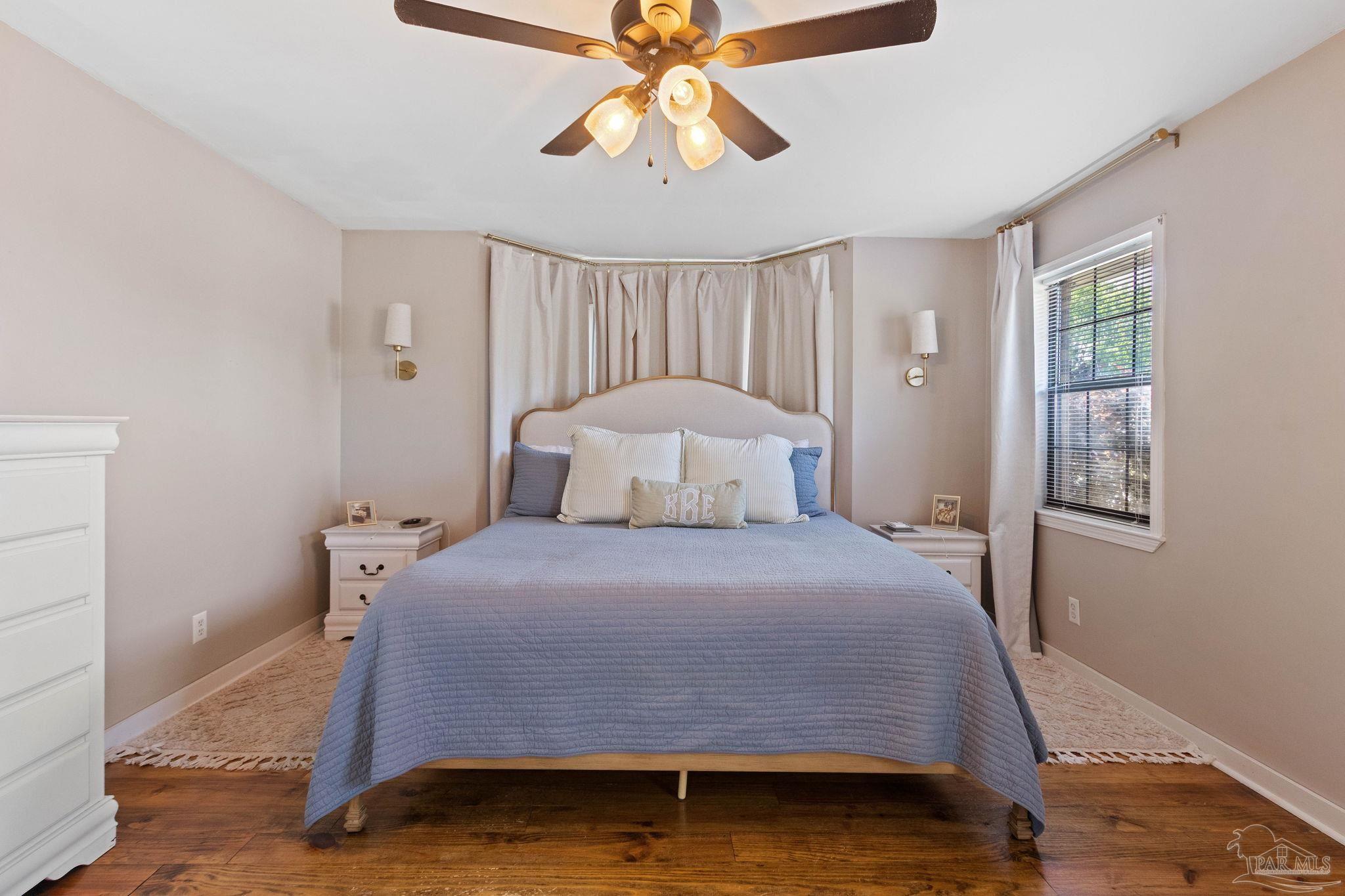 4349 Turkey Hollow Road Frisco City, AL 36445 - Photo 4 of 64 a bedroom with a bed and window