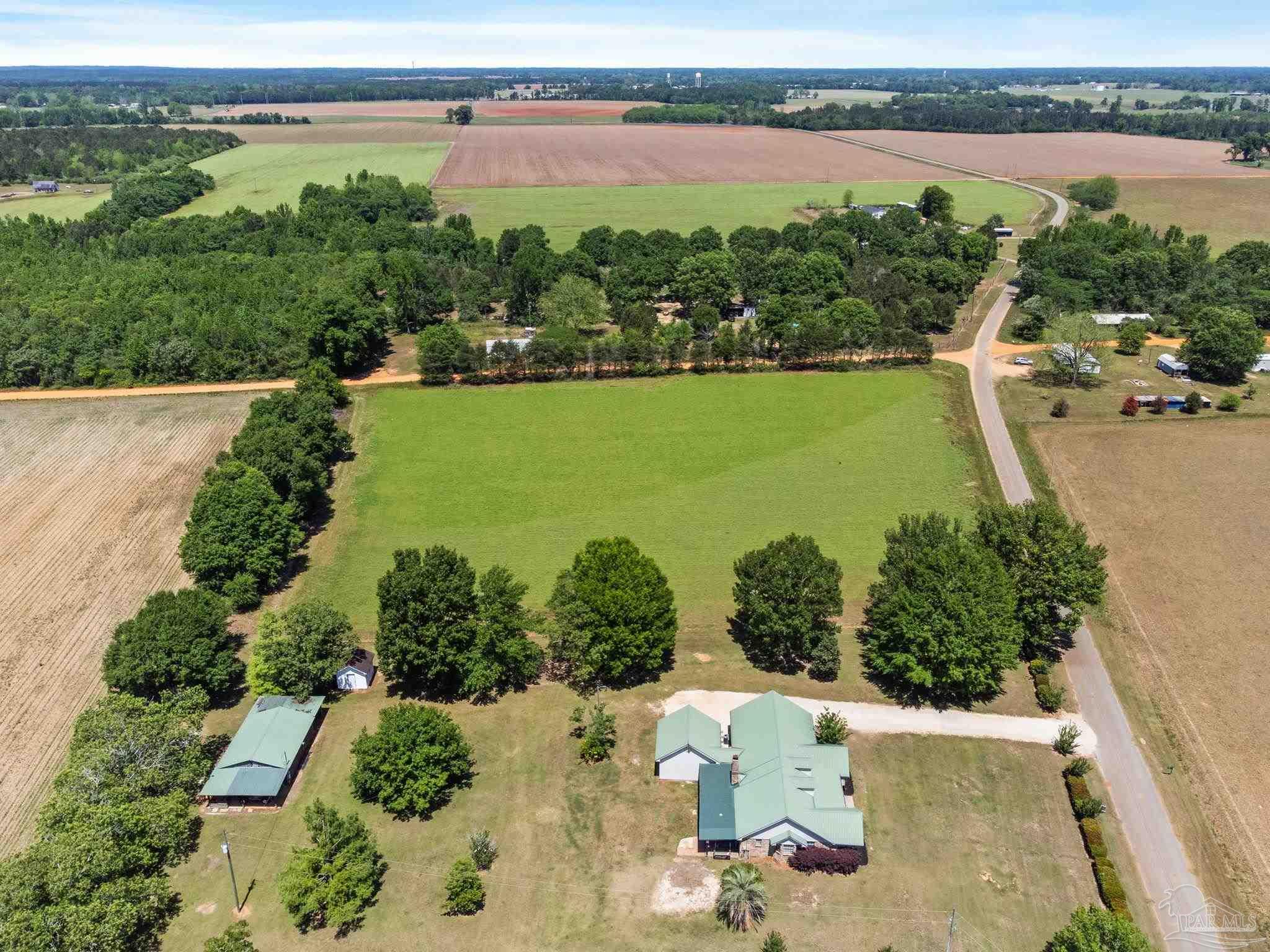 4349 Turkey Hollow Road Frisco City, AL 36445 - Photo 54 of 64 an aerial view of a city with houses