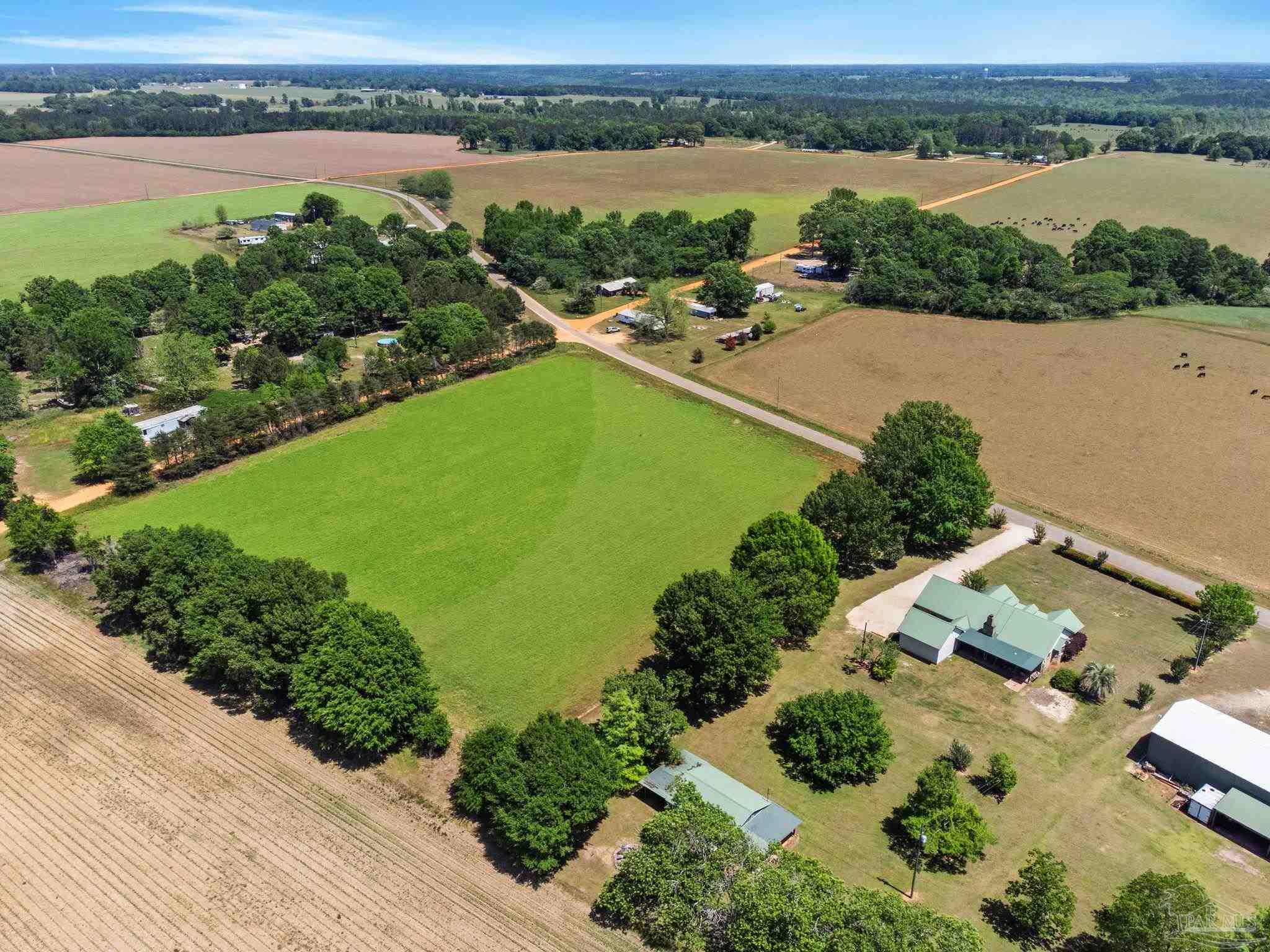 4349 Turkey Hollow Road Frisco City, AL 36445 - Photo 61 of 64 an aerial view of a house with a lake view