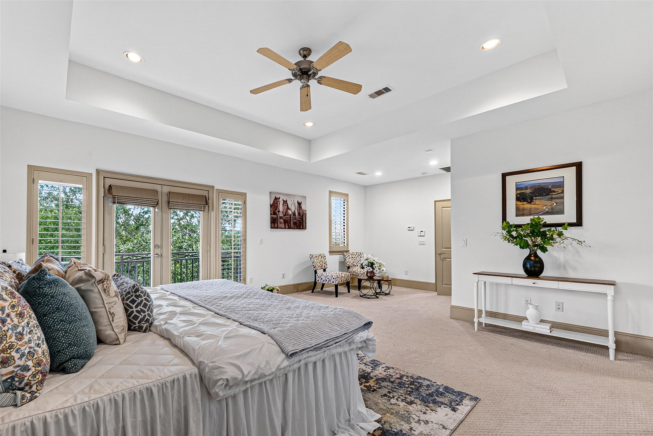 2034 Colquitt Street, Unit A Houston, TX 77098 - Photo 27 of 41 Large primary bedroom with double doors leading to a 3rd floor balcony.