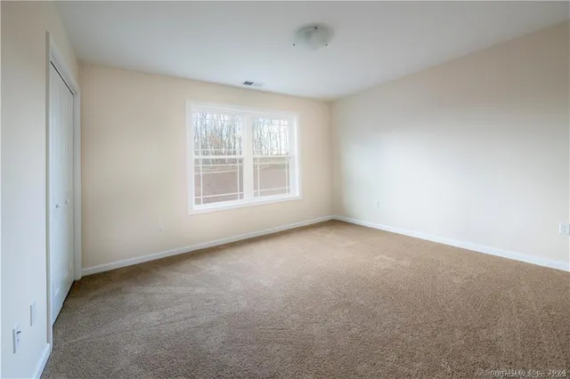 an empty room with a window